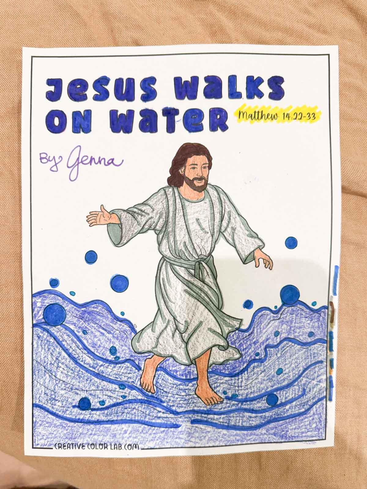 Jesus coloring page filled in with crayon.