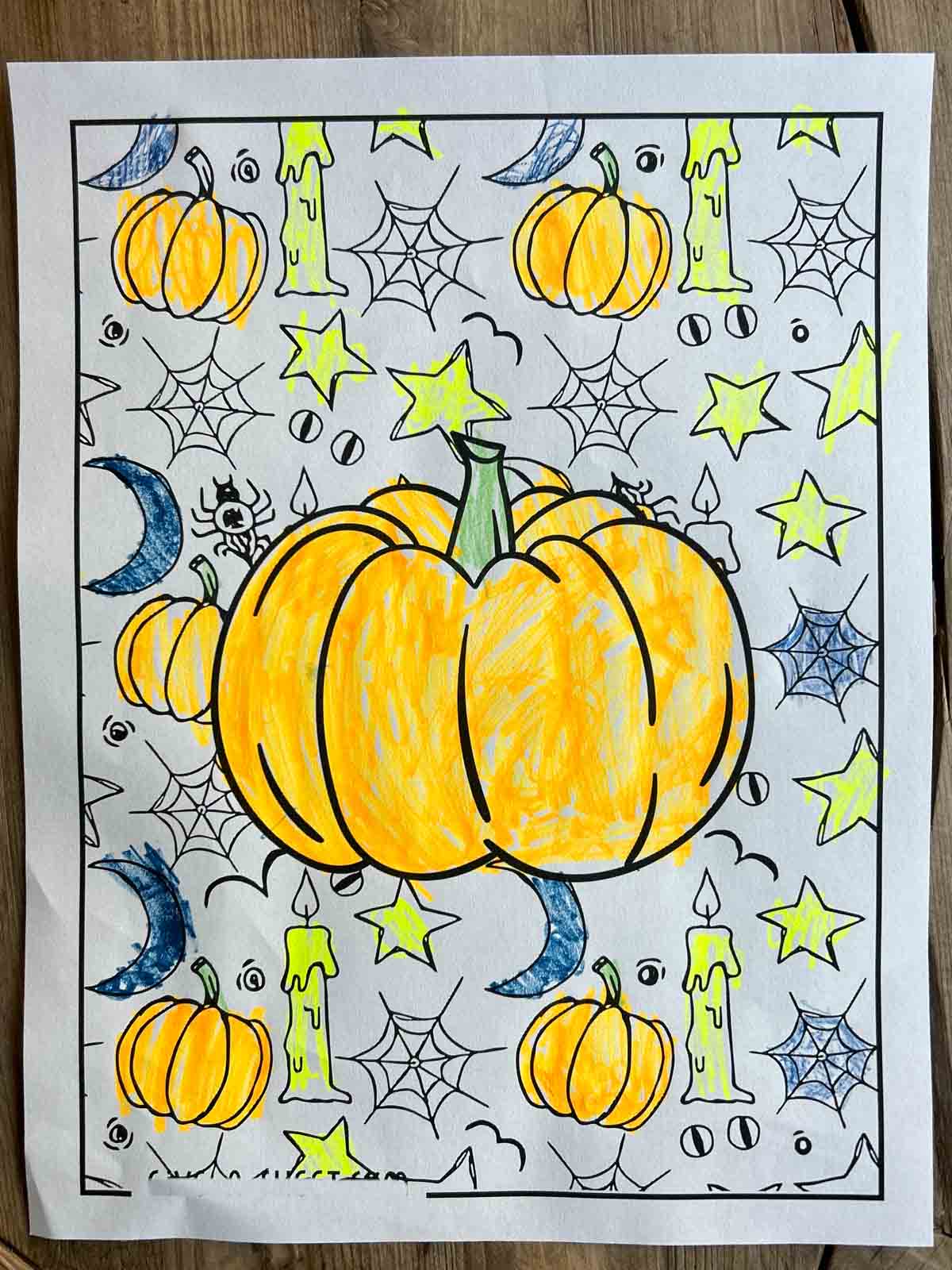 A colored in pumpkin coloring page.