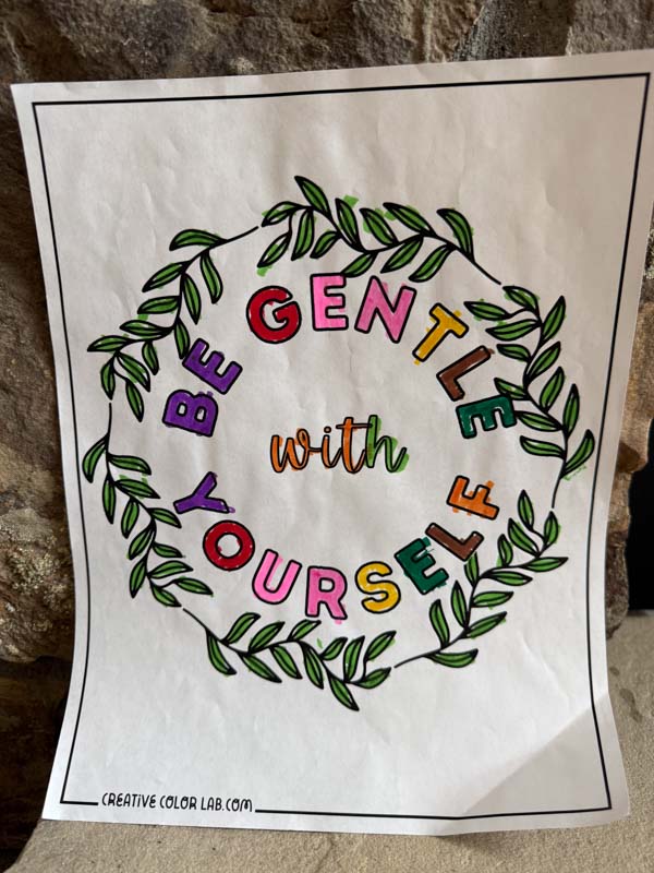 Completed insipirational quote coloring page.