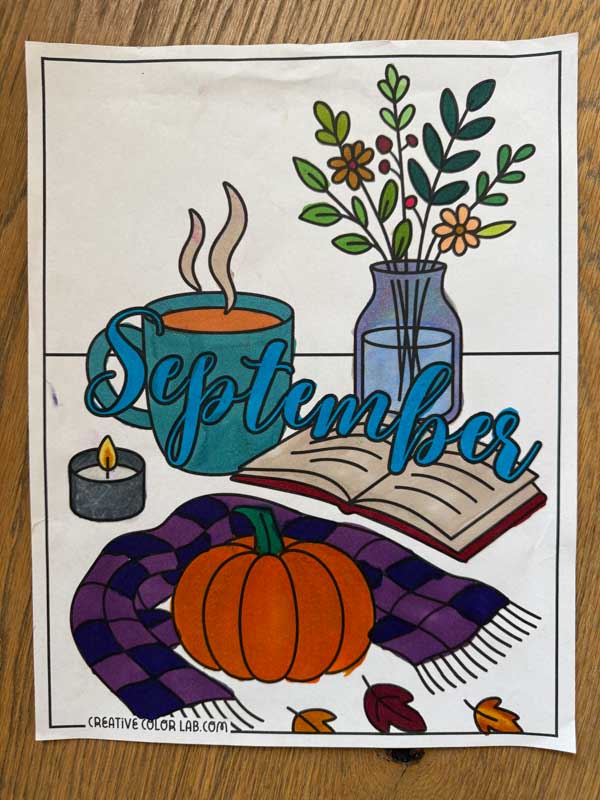 A colored in September coloring page by an adult.
