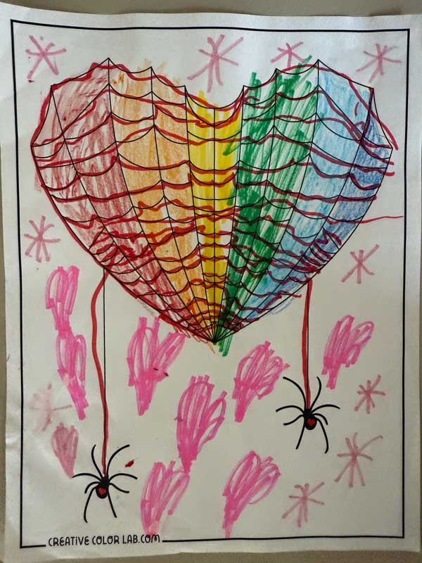 A spider coloring page colored by a kid.