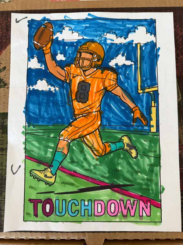 Colored sports coloring page by a kid.