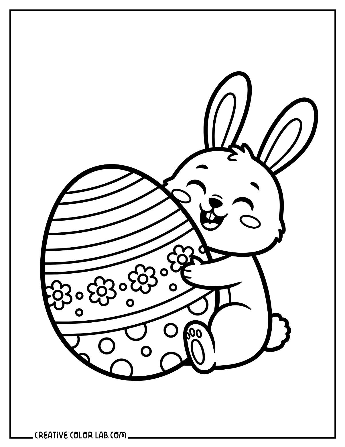 A cute easter bunny hugging an egg picture to color in.